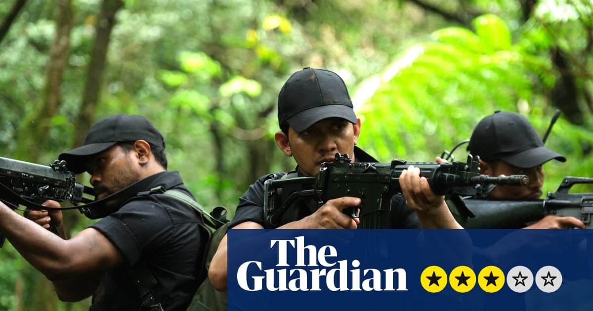 Three men in black tactical gear aim rifles while moving through a dense forest