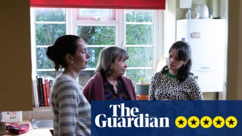 Kate O'Flynn, Marion Bailey, and Alice Bailey Johnson stand talking in a kitchen, one holding a dish towel