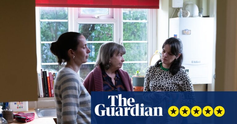Kate O'Flynn, Marion Bailey, and Alice Bailey Johnson stand talking in a kitchen, one holding a dish towel