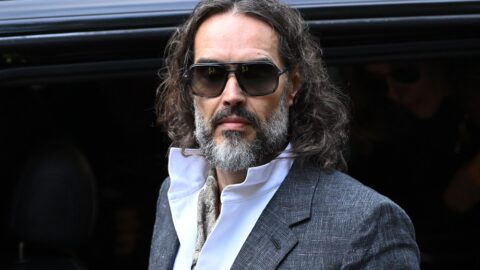 LONDON, ENGLAND - OCTOBER 12: Russell Brand arrives at court ahead of his trial, where he faces rape and sexual assault charges at Southwark Crown Court on October 12, 2026 in London, England. Russell Brand has been charged with three counts of rape, three counts of sexual assault and one count of indecent assault. He has denied all charges (Photo by Leon Neal/Getty Images)